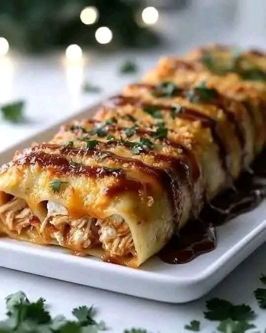 Indulge in these irresistibly flavorful lasagna rolls, packed with smoky BBQ chicken, rich cheeses, and a hint of spice. Perfectly baked to golden perfection, this dish is a must-try for any comfort food lover.