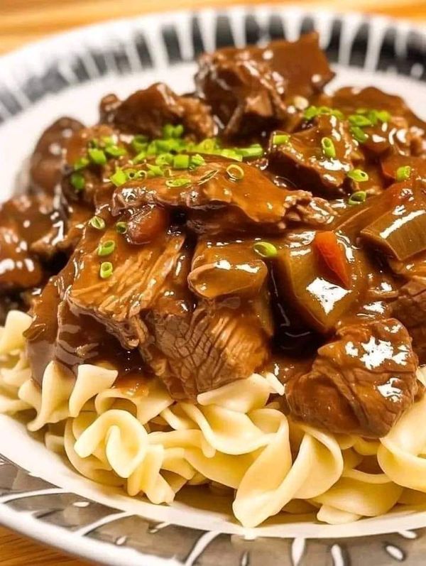 Best Ever Crockpot Beef Tips and Noodles